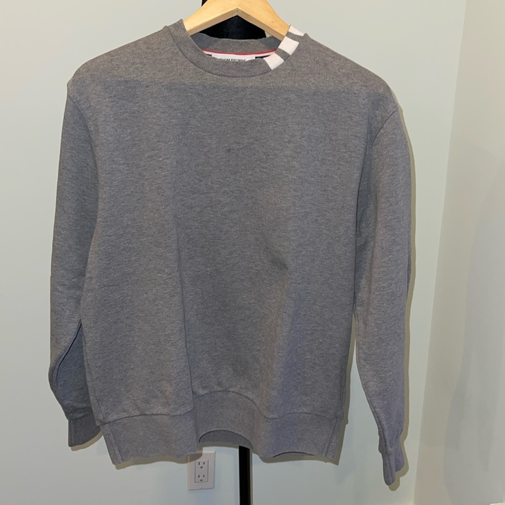Thom Browne sweater.